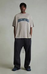 Fear of God ESSENTIALS Vintage Black Fleece Flare Sweatpants
