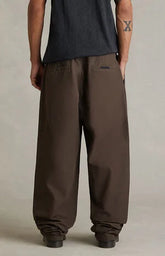 Fear of God ESSENTIALS Brown Pleated Baggy Pants